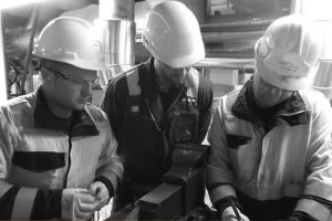 Superheat technicians working at a job site