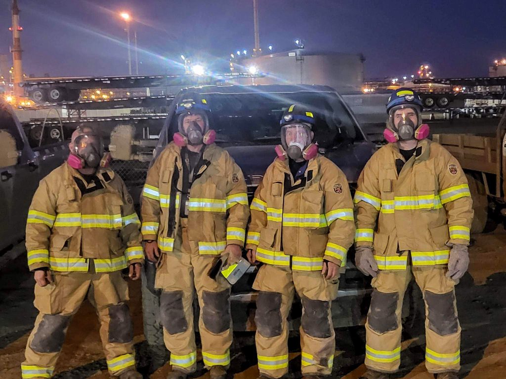 Superheat onsite heat treatment crew wearing fire protective gear